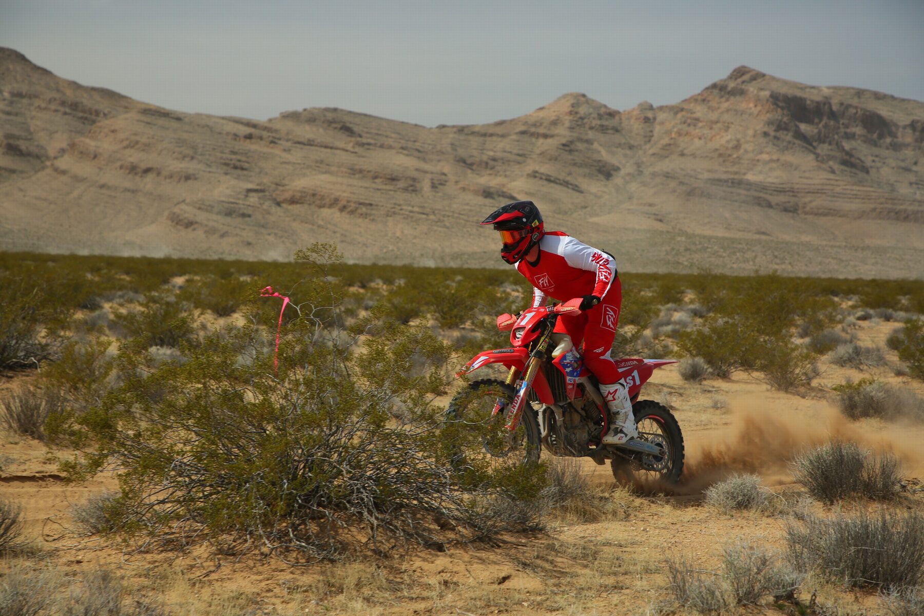 Wyatt Cooper riding a desert race course